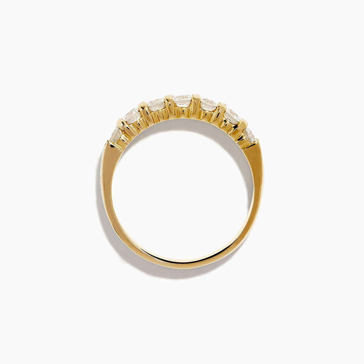 The 14K Yellow Gold 7-Stone Prong Set Diamond Band, 0.75 TCW, showcases a row of seven round diamonds set in yellow gold and displayed against a plain white background.
