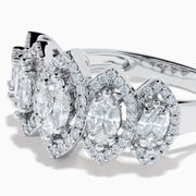 The 14K White Gold Diamond Marquise Halo Band Ring features five marquise diamond clusters, each surrounded by a halo of smaller diamonds, shown against a plain white background.