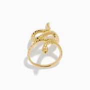 The 14K Yellow Gold Snake Ring features a coiled serpent design with detailed scales, elegantly wrapping around the finger. Displayed against a plain white background, this striking ring is crafted in yellow gold.