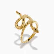 The 14K Yellow Gold Snake Ring features a coiled serpent design with detailed scales, elegantly wrapping around the finger. Displayed against a plain white background, this striking ring is crafted in yellow gold.