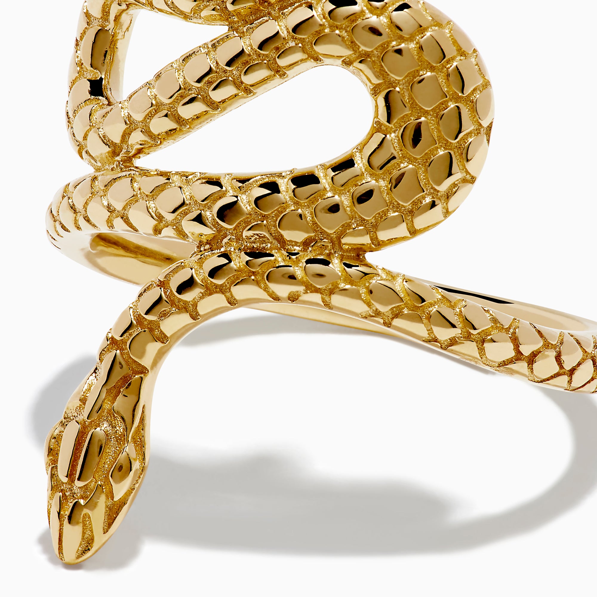 The 14K Yellow Gold Snake Ring features a coiled serpent design with detailed scales, elegantly wrapping around the finger. Displayed against a plain white background, this striking ring is crafted in yellow gold.