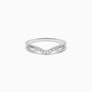 The Classique 14K White Gold Diamond Wedding Band features a subtle chevron shape with small round diamonds along the curved top and a sleek, polished, minimalist design.