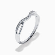 The Classique 14K White Gold Diamond Wedding Band features a subtle chevron shape with small round diamonds along the curved top and a sleek, polished, minimalist design.