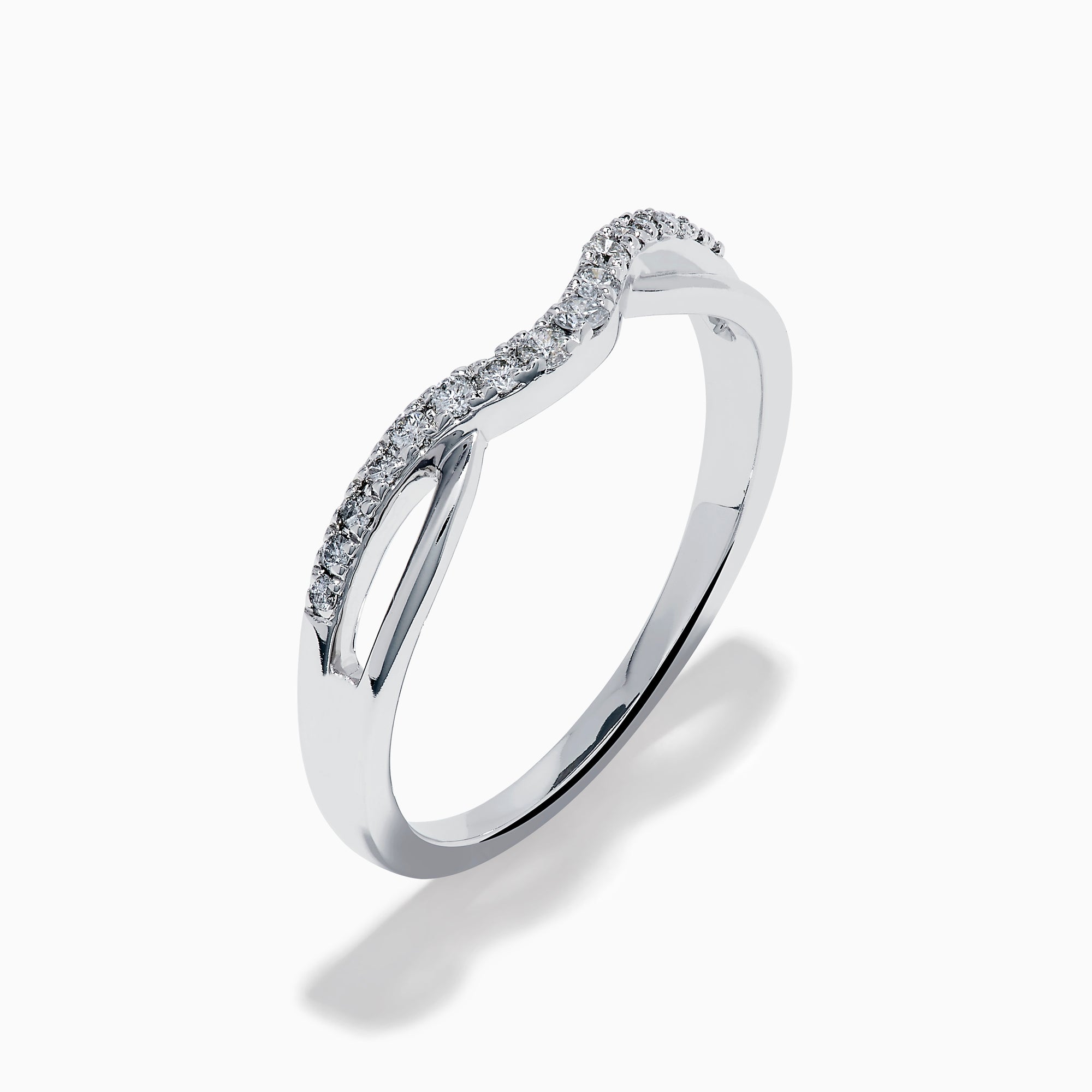 The Classique 14K White Gold Diamond Wedding Band features a subtle chevron shape with small round diamonds along the curved top and a sleek, polished, minimalist design.