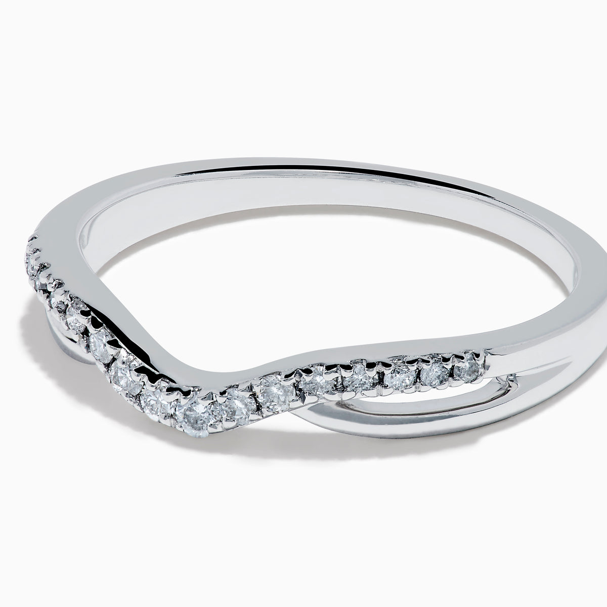The Classique 14K White Gold Diamond Wedding Band features a subtle chevron shape with small round diamonds along the curved top and a sleek, polished, minimalist design.