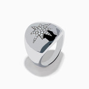 The 925 Sterling Silver Diamond Star Signet Ring features a raised star design encrusted with sparkling diamonds, showcased against a plain white background.