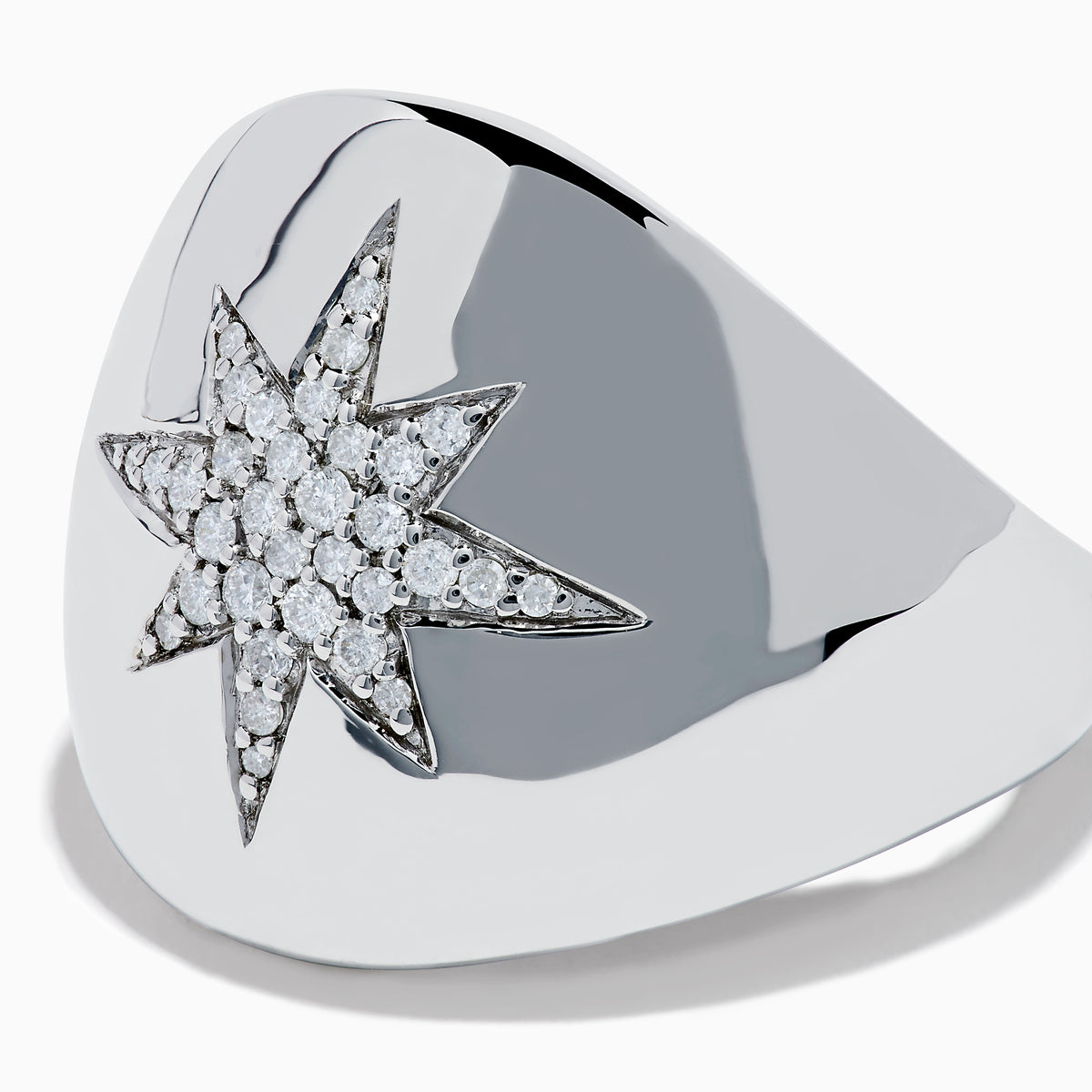 The 925 Sterling Silver Diamond Star Signet Ring features a raised star design encrusted with sparkling diamonds, showcased against a plain white background.