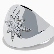 The 925 Sterling Silver Diamond Star Signet Ring features a raised star design encrusted with sparkling diamonds, showcased against a plain white background.