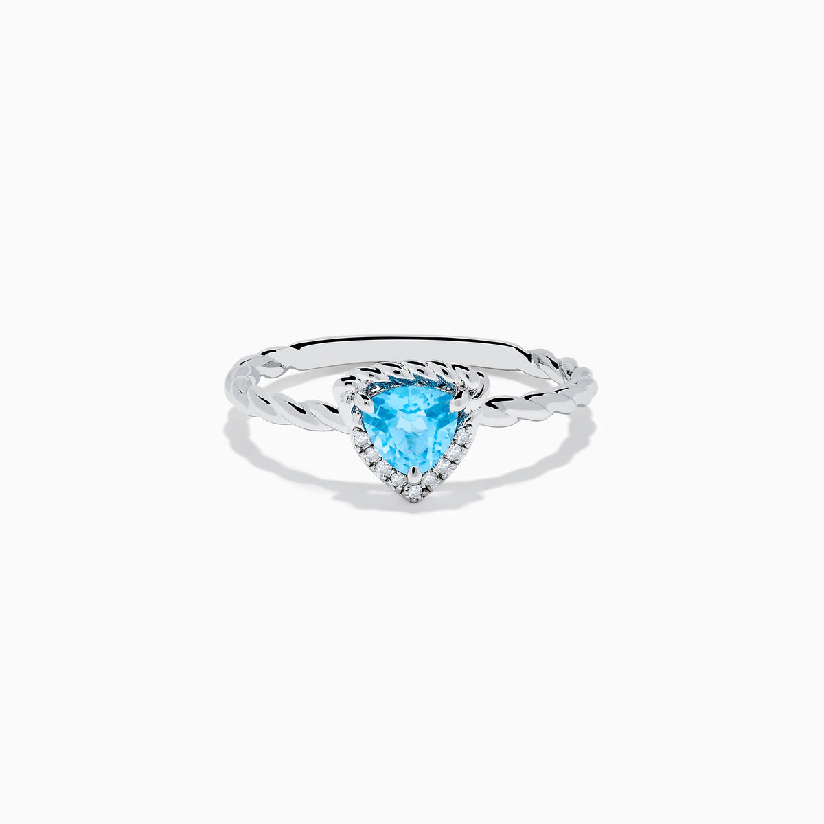 The 925 Sterling Silver Blue Topaz and Diamond Ring features a twisted band, a heart-shaped blue topaz center, and sparkling diamonds, shown against a plain white background.