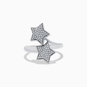 The Novelty 925 Sterling Silver and Diamond Star Ring features two star-shaped settings with sparkling stones, crafted from sterling silver and shown against a white background.