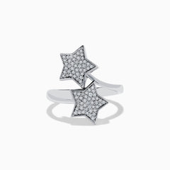 The Novelty 925 Sterling Silver and Diamond Star Ring features two star-shaped settings with sparkling stones, crafted from sterling silver and shown against a white background.