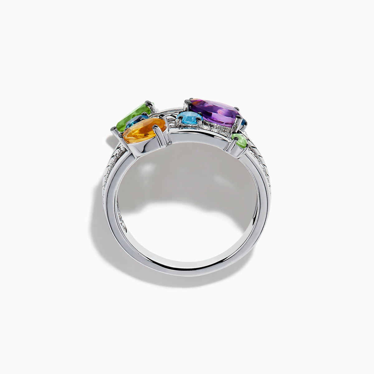 The Mosaic 925 Sterling Silver Multi Gemstone and Diamond Ring features pear-shaped purple, orange, green, and blue stones with round diamond accents and geometric engraving across multiple bands.