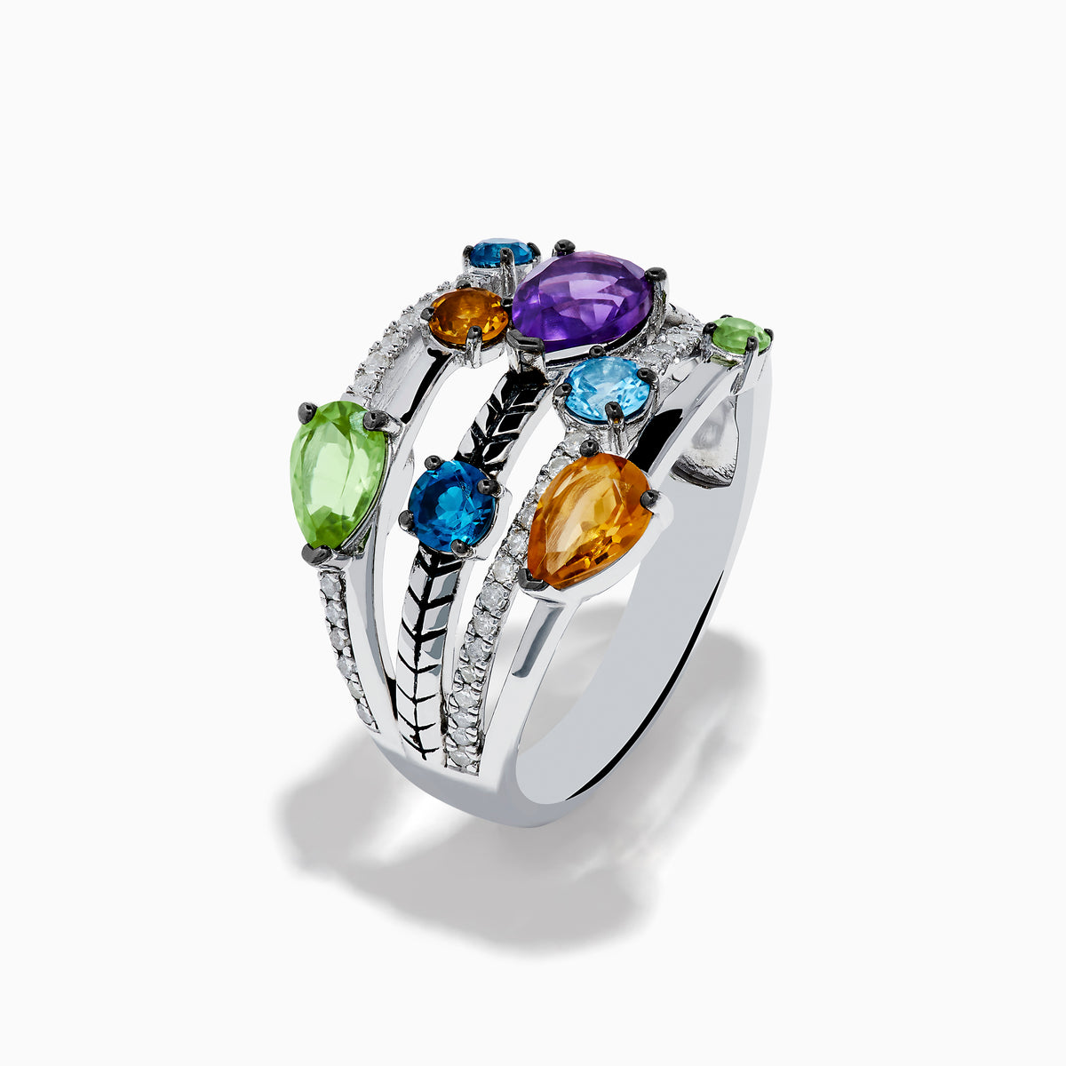 The Mosaic 925 Sterling Silver Multi Gemstone and Diamond Ring features pear-shaped purple, orange, green, and blue stones with round diamond accents and geometric engraving across multiple bands.