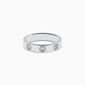 The 925 Sterling Silver Diamond Ring features three evenly spaced round diamonds set into a sleek silver band, shown against a plain white background.