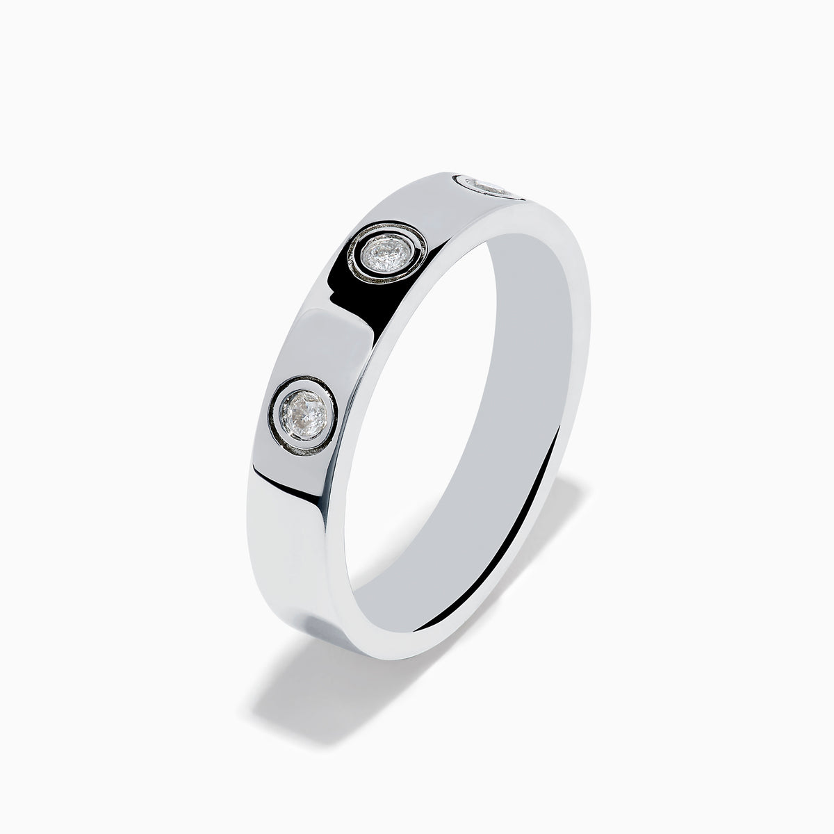 The 925 Sterling Silver Diamond Ring features three evenly spaced round diamonds set into a sleek silver band, shown against a plain white background.