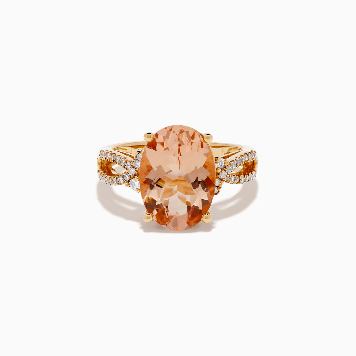 The 14K Rose Gold Morganite and Diamond Twist Band Ring features an oval peach morganite center stone with rows of white diamonds on a unique twist band, shown against a white background.
