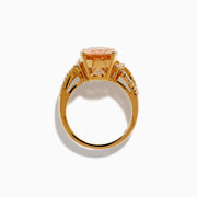 The 14K Rose Gold Morganite and Diamond Twist Band Ring features an oval peach morganite center stone with rows of white diamonds on a unique twist band, shown against a white background.