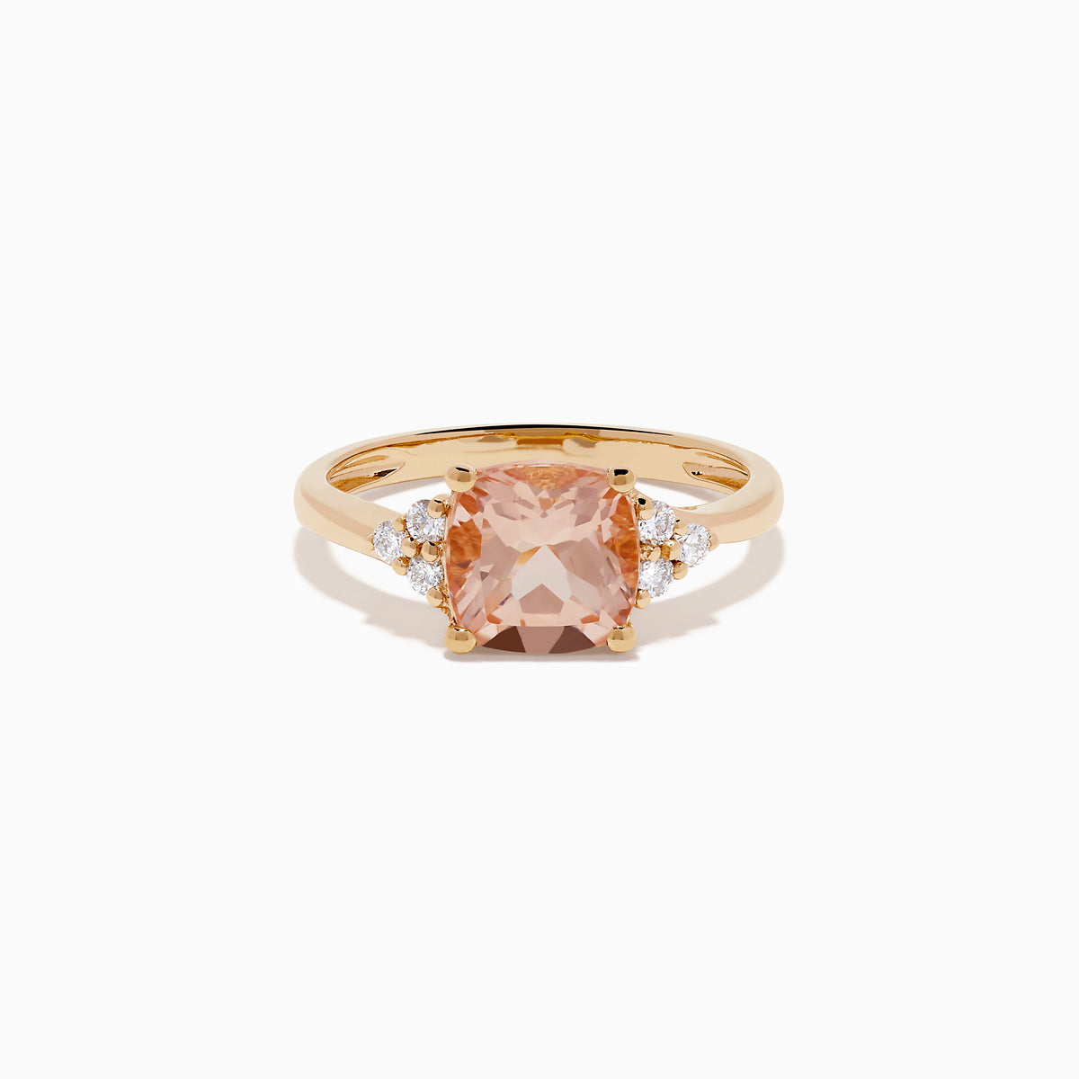 A beautiful 14K Rose Gold Cushion Solitaire Morganite and Diamond Ring featuring a large peach cushion-cut morganite center stone, accented by three round white diamonds on each side.