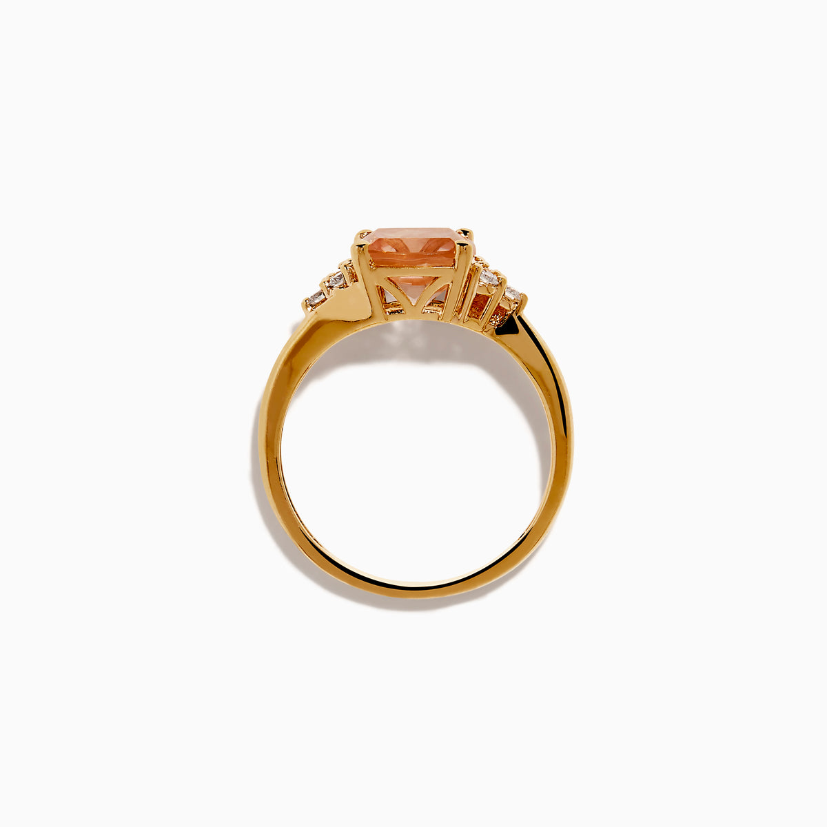 A beautiful 14K Rose Gold Cushion Solitaire Morganite and Diamond Ring featuring a large peach cushion-cut morganite center stone, accented by three round white diamonds on each side.
