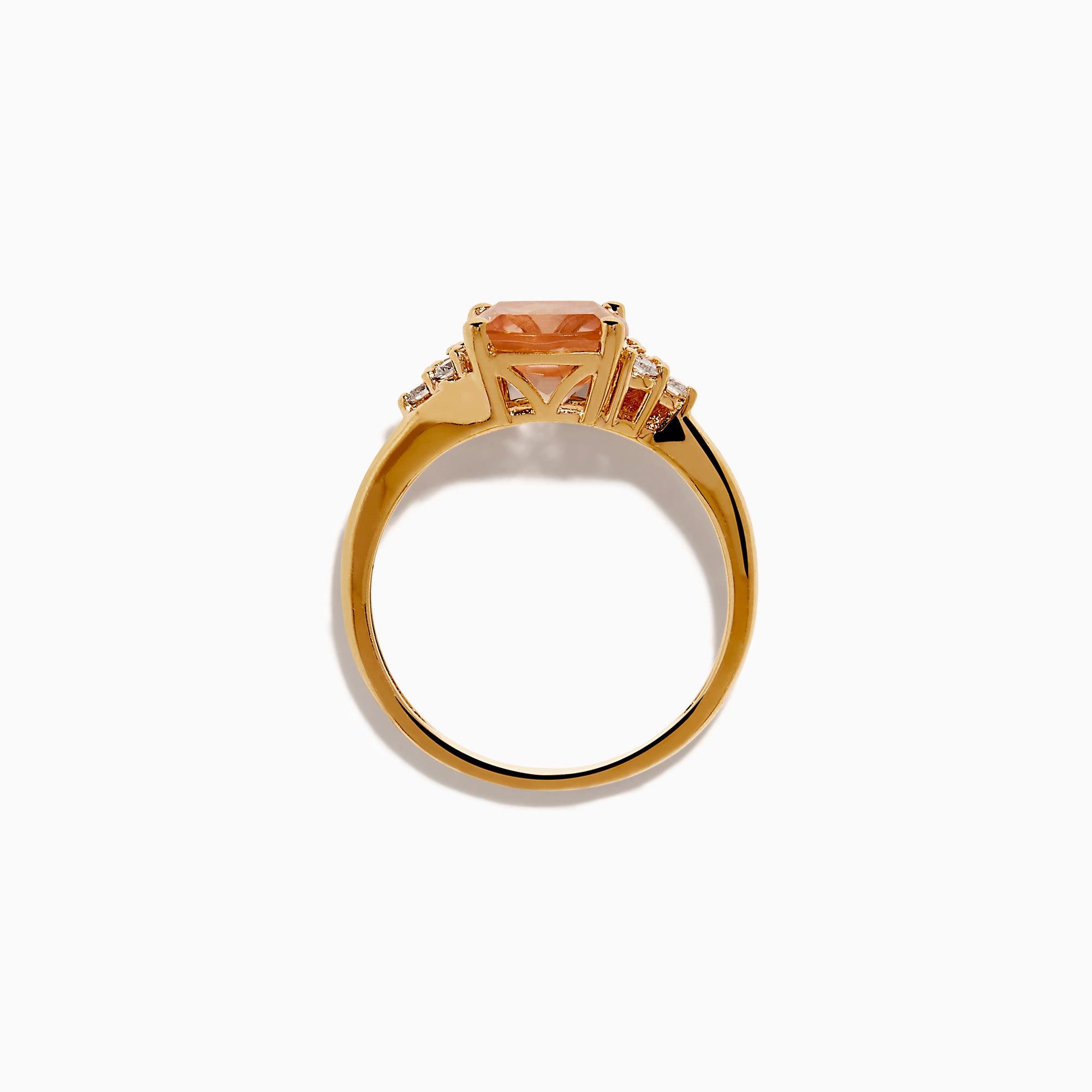 A beautiful 14K Rose Gold Cushion Solitaire Morganite and Diamond Ring featuring a large peach cushion-cut morganite center stone, accented by three round white diamonds on each side.