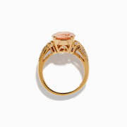 The 14K Rose Gold Oval Solitaire Morganite and Diamond Ring features a large pink morganite centerpiece, accented by two rows of sparkling diamonds along the split shank rose gold band.