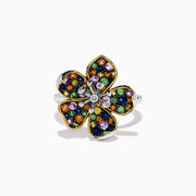 The Splash Sterling Silver Diamond and Multi Sapphires Flower Ring features a clover-shaped design with gold-outlined petals, sapphires, multicolored gemstones, and a sterling silver band, shown on a white background.