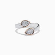 The 925 Sterling Silver & 14K Rose Gold Diamond Bypass Ring features a ribbed open band with two teardrop-shaped, diamond-encrusted ends outlined in rose gold, creating an elegant look against a white background.