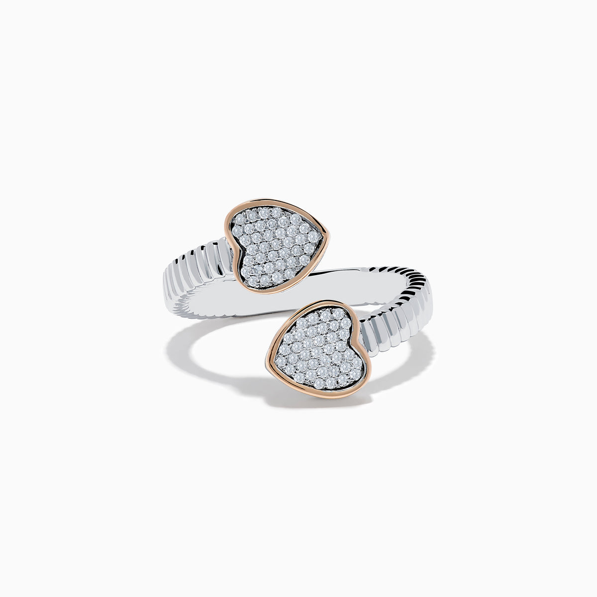The 925 Sterling Silver & 14K Rose Gold Diamond Heart Bypass Ring features a ribbed band with two open ends, each accented by a heart-shaped cluster of small diamonds outlined in rose gold. Shown on a white background.