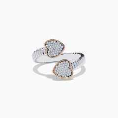 The 925 Sterling Silver & 14K Rose Gold Diamond Heart Bypass Ring features a ribbed band with two open ends, each accented by a heart-shaped cluster of small diamonds outlined in rose gold. Shown on a white background.
