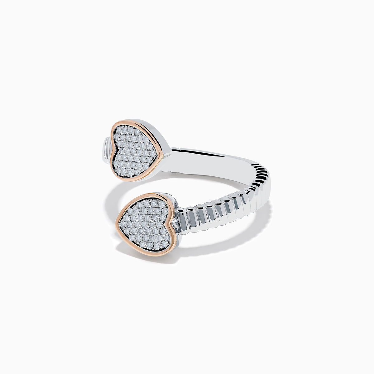 The 925 Sterling Silver & 14K Rose Gold Diamond Heart Bypass Ring features a ribbed band with two open ends, each accented by a heart-shaped cluster of small diamonds outlined in rose gold. Shown on a white background.