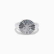 The 925 Sterling Silver Diamond Star Ring features a raised, textured starburst design on its circular face with a central cluster of sparkling stones.