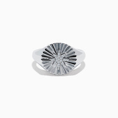 The 925 Sterling Silver Diamond Star Ring features a raised, textured starburst design on its circular face with a central cluster of sparkling stones.
