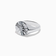 The 925 Sterling Silver Diamond Star Ring features a raised, textured starburst design on its circular face with a central cluster of sparkling stones.