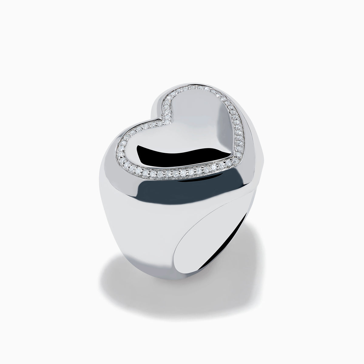 The 925 Sterling Silver Diamond Bubble Heart Ring features a smooth, reflective heart shape bordered by sparkling diamond-like gems, set against a white background.