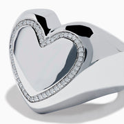 The 925 Sterling Silver Diamond Bubble Heart Ring features a smooth, reflective heart shape bordered by sparkling diamond-like gems, set against a white background.