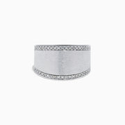 The 925 Sterling Silver Diamond Wide Ring features a brushed matte finish and rows of sparkling diamonds along the borders, displayed against a plain white background.
