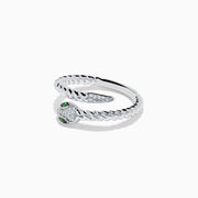 The 925 Sterling Silver Diamond and Tsavorite Snake Ring features a twisted snake design with a head adorned with clear stones and two tsavorite green gemstone eyes, set against a white background.