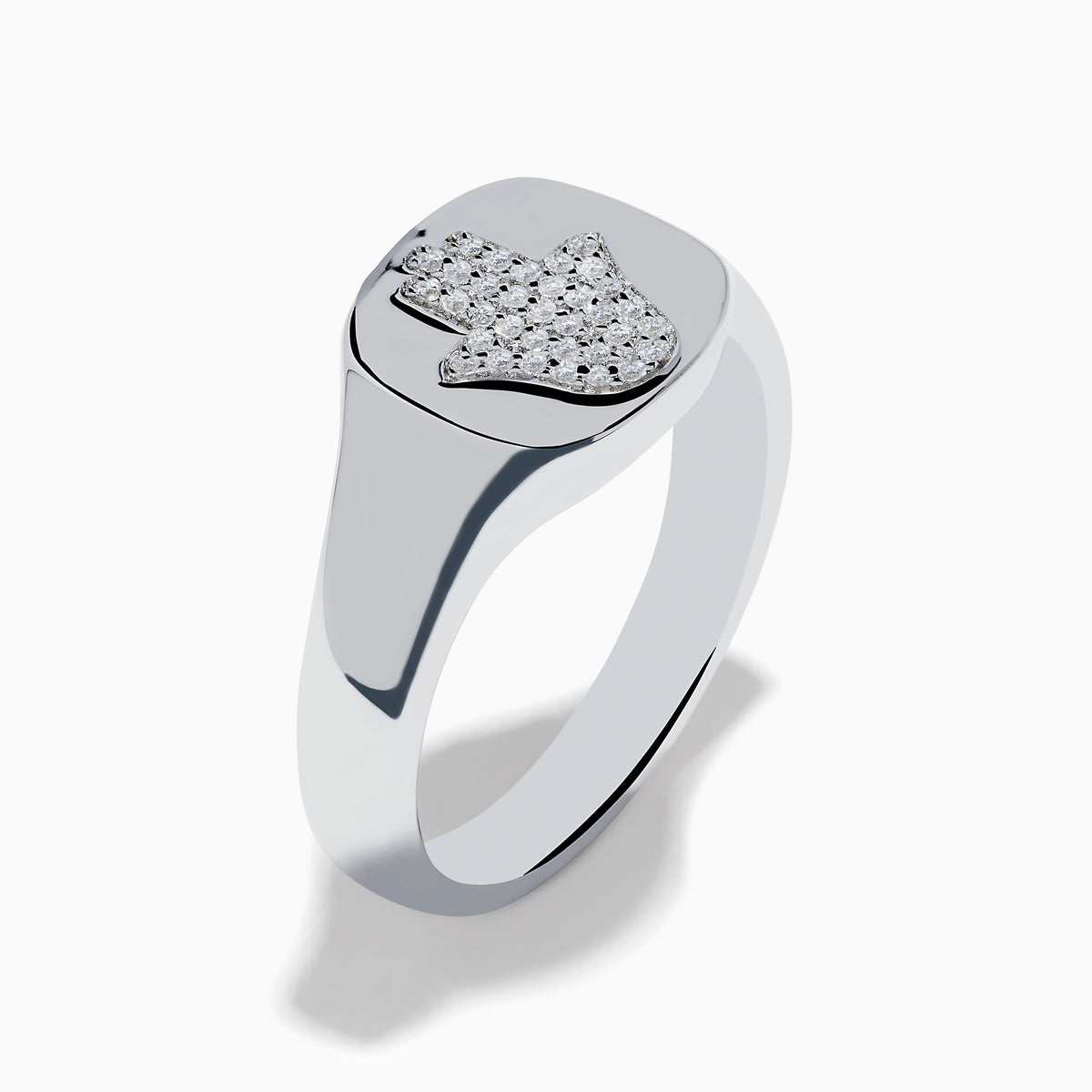 The 925 Sterling Silver Diamond Hamsa Ring features a round face adorned with small clear stones, giving it a sparkling finish.