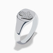 The 925 Sterling Silver Diamond Hamsa Ring features a round face adorned with small clear stones, giving it a sparkling finish.