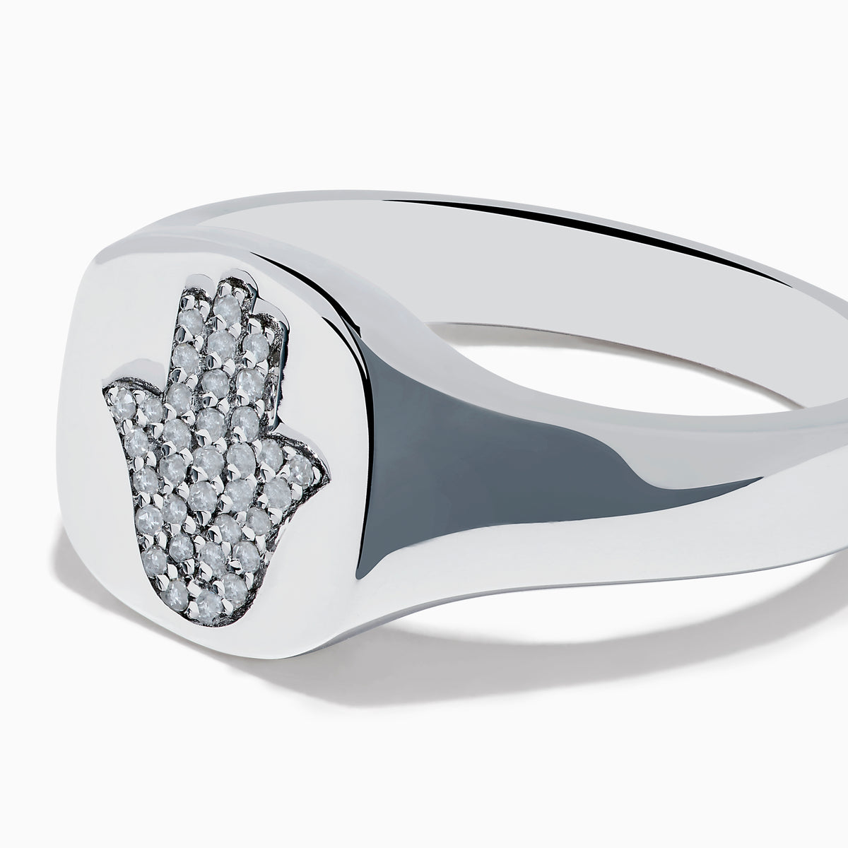 The 925 Sterling Silver Diamond Hamsa Ring features a round face adorned with small clear stones, giving it a sparkling finish.