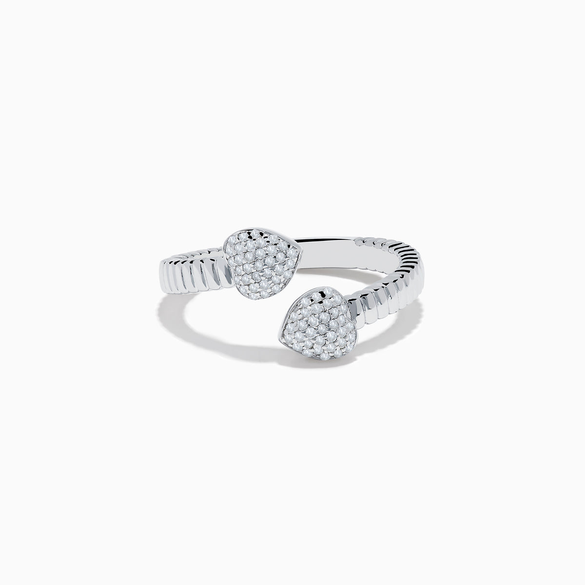 The 925 Sterling Silver Diamond Bypass Heart Ring features two heart-shaped ends encrusted with sparkling white gemstones, elegantly set against a plain white background.
