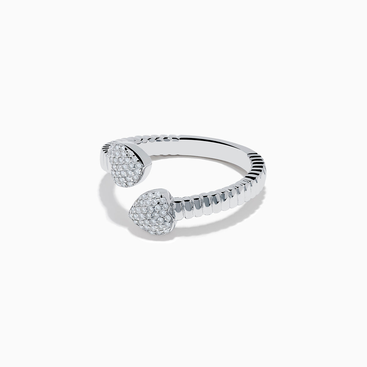 The 925 Sterling Silver Diamond Bypass Heart Ring features two heart-shaped ends encrusted with sparkling white gemstones, elegantly set against a plain white background.