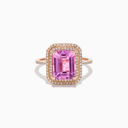 The 14K Rose Gold Kunzite and Diamond Double Halo Ring features a rectangular pink Kunzite, framed by two rows of diamonds on a rose gold band, presented against a plain white background.
