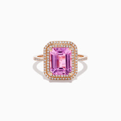The 14K Rose Gold Kunzite and Diamond Double Halo Ring features a rectangular pink Kunzite, framed by two rows of diamonds on a rose gold band, presented against a plain white background.