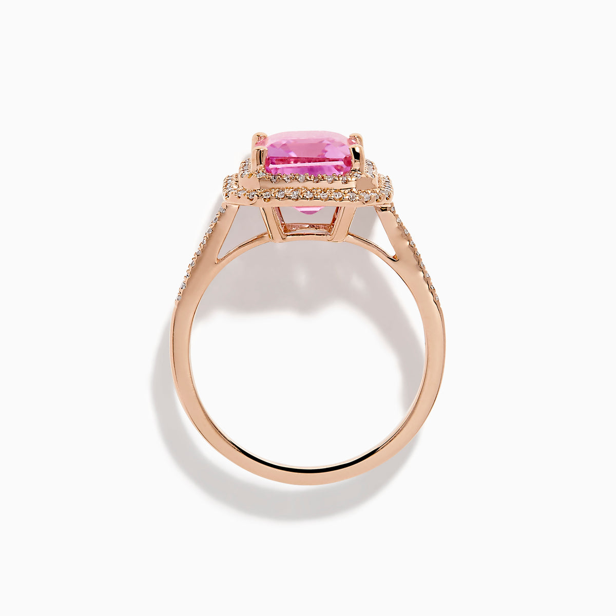 The 14K Rose Gold Kunzite and Diamond Double Halo Ring features a rectangular pink Kunzite, framed by two rows of diamonds on a rose gold band, presented against a plain white background.