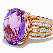 The 14K Rose Gold Purple Amethyst and Diamond Cocktail Ring features a large oval purple amethyst center, accented by three rows of small rectangular diamonds on each side, set in rose gold.