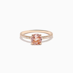 The Blush 14K Rose Gold Morganite and Diamond Ring features a large oval peach morganite center and sparkling diamonds along the band, shown on a white background.