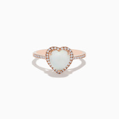 The Aurora 14K Rose Gold Diamond and Opal Heart Ring features a heart-shaped opal center, sparkling diamonds encircling it, and additional diamonds set along the elegant rose gold band.