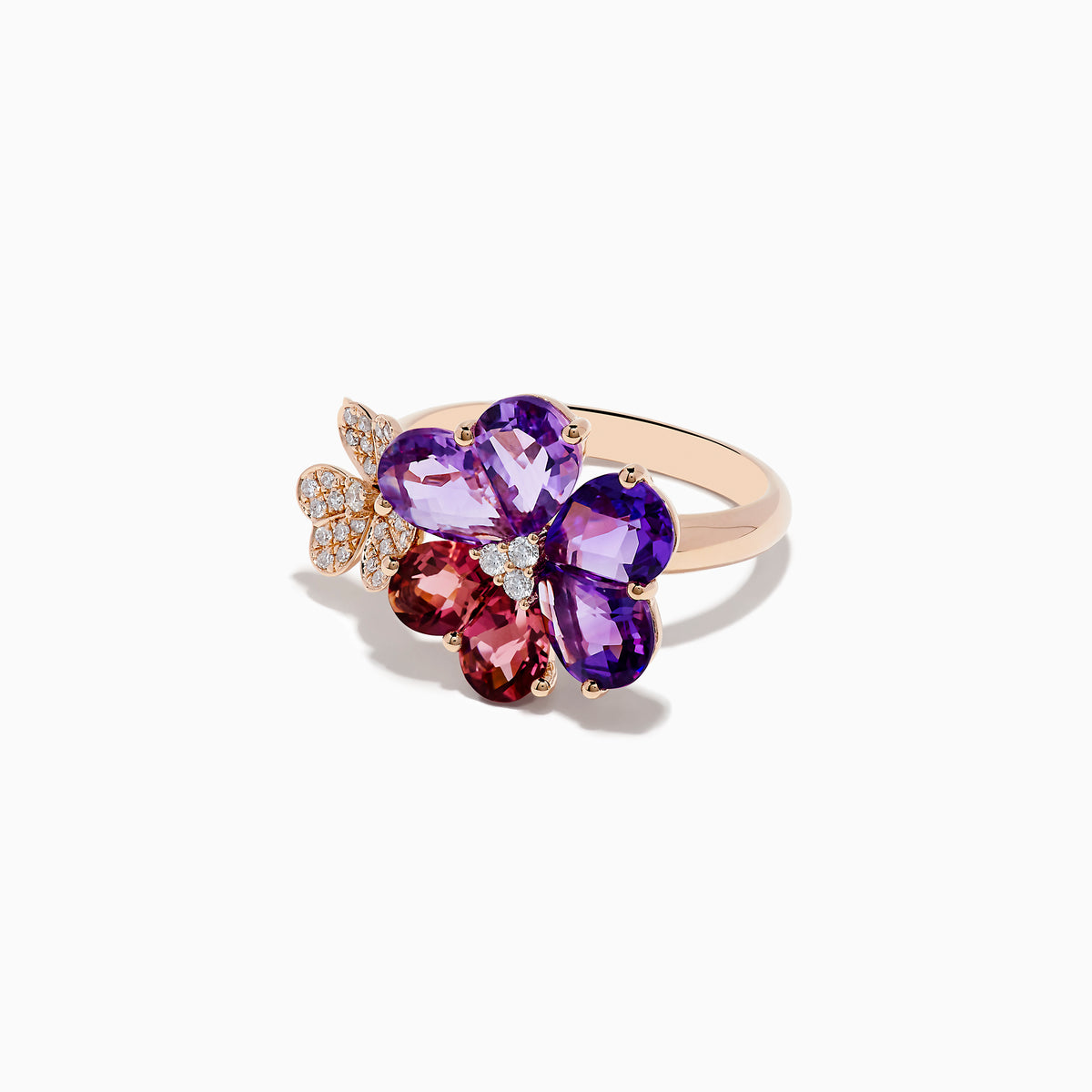 The 14K Rose Gold Amethyst and Pink Tourmaline Flower Ring features a large flower with amethyst and pink tourmaline petals, a diamond center, and a smaller flower accented with diamonds—all set in rose gold.