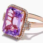 The 14K Rose Gold Pink Amethyst and Diamond Cocktail Ring features a large rectangular pink amethyst, accented by round diamonds on each side, displayed on a white background.